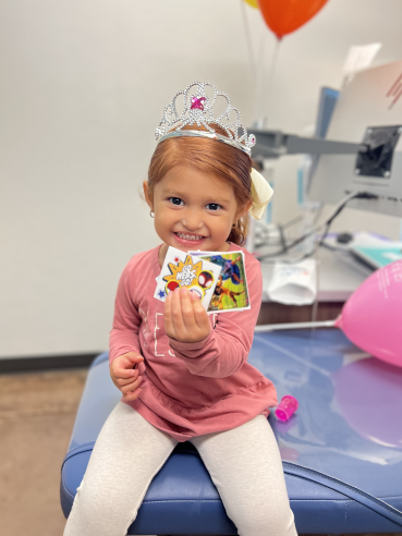 Happy Tucson Patient with Prizes